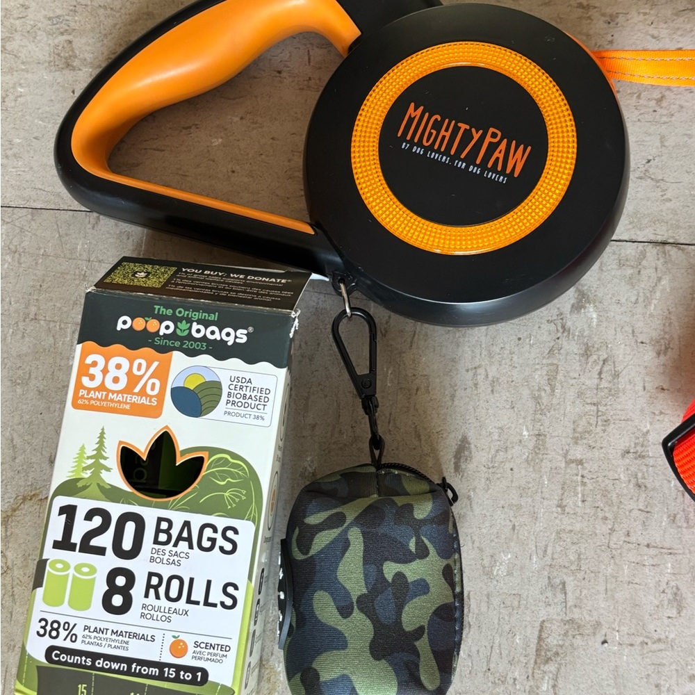 Orange Retractable Dog Leash with Camouflage Bag Holder